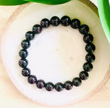 "THE STONE OF PASSION, ENERGY, AND POWER" - Ruby 8mm Beaded Bracelet