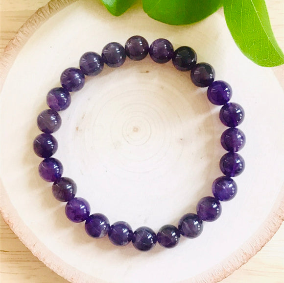 “PROTECTION, TRANQUILITY, CONTENTMENT”- Amethyst 8mm Beaded Bracelet